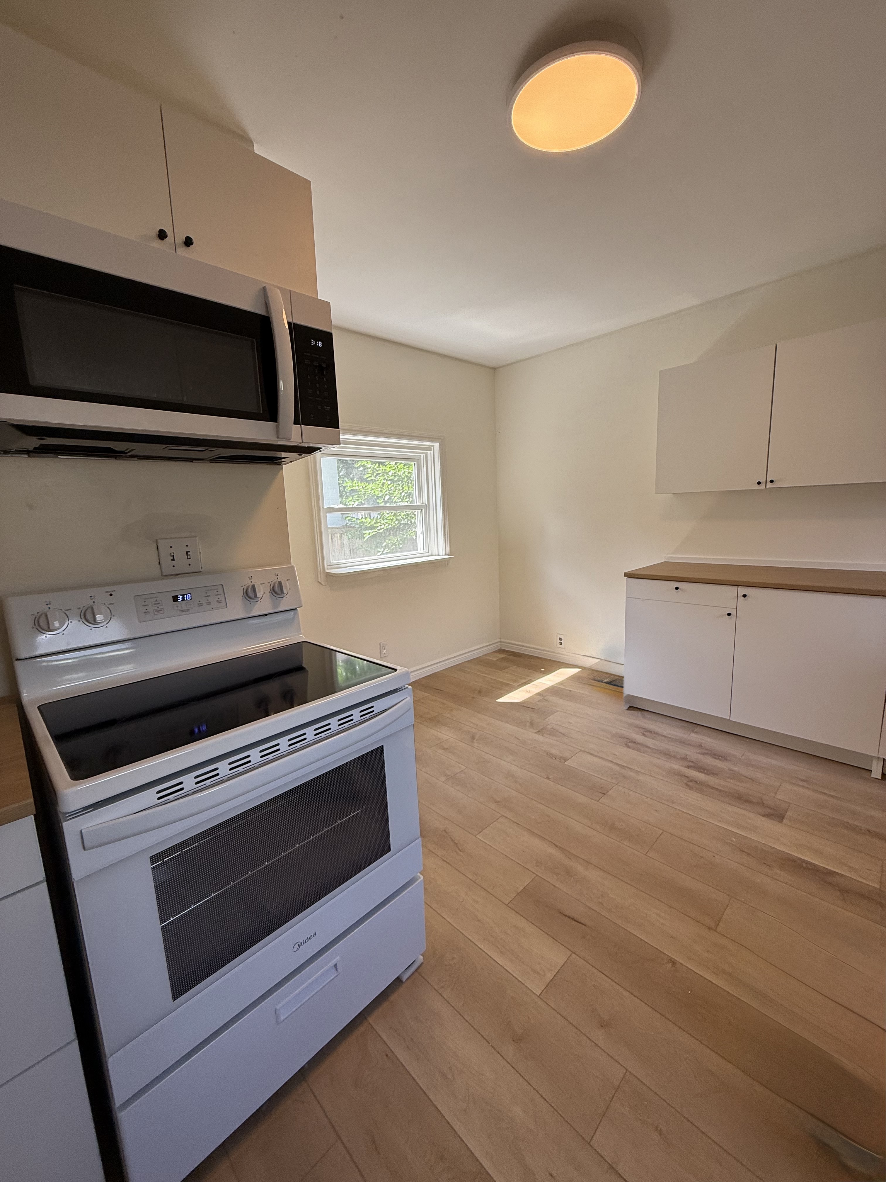 Main floor kitchen additional view - London Ontario apartment rental with modern appliances